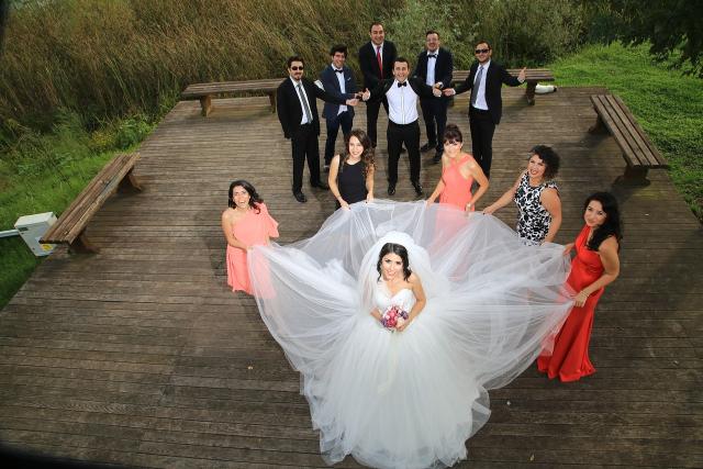 Wedding party on wooden deck